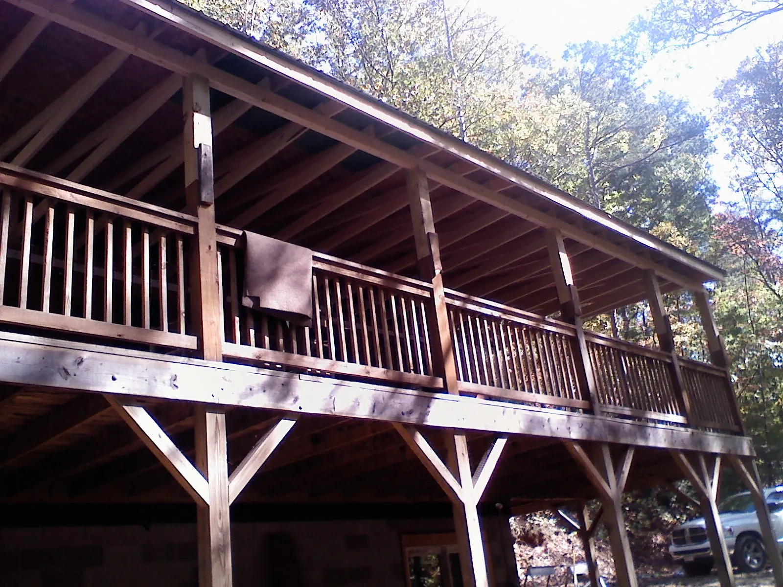 Timber framing under a new elevated porch and deck — Roof Leak Repair in Swain by Roofing Brothers